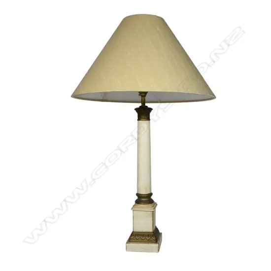 A table lamp and shade,